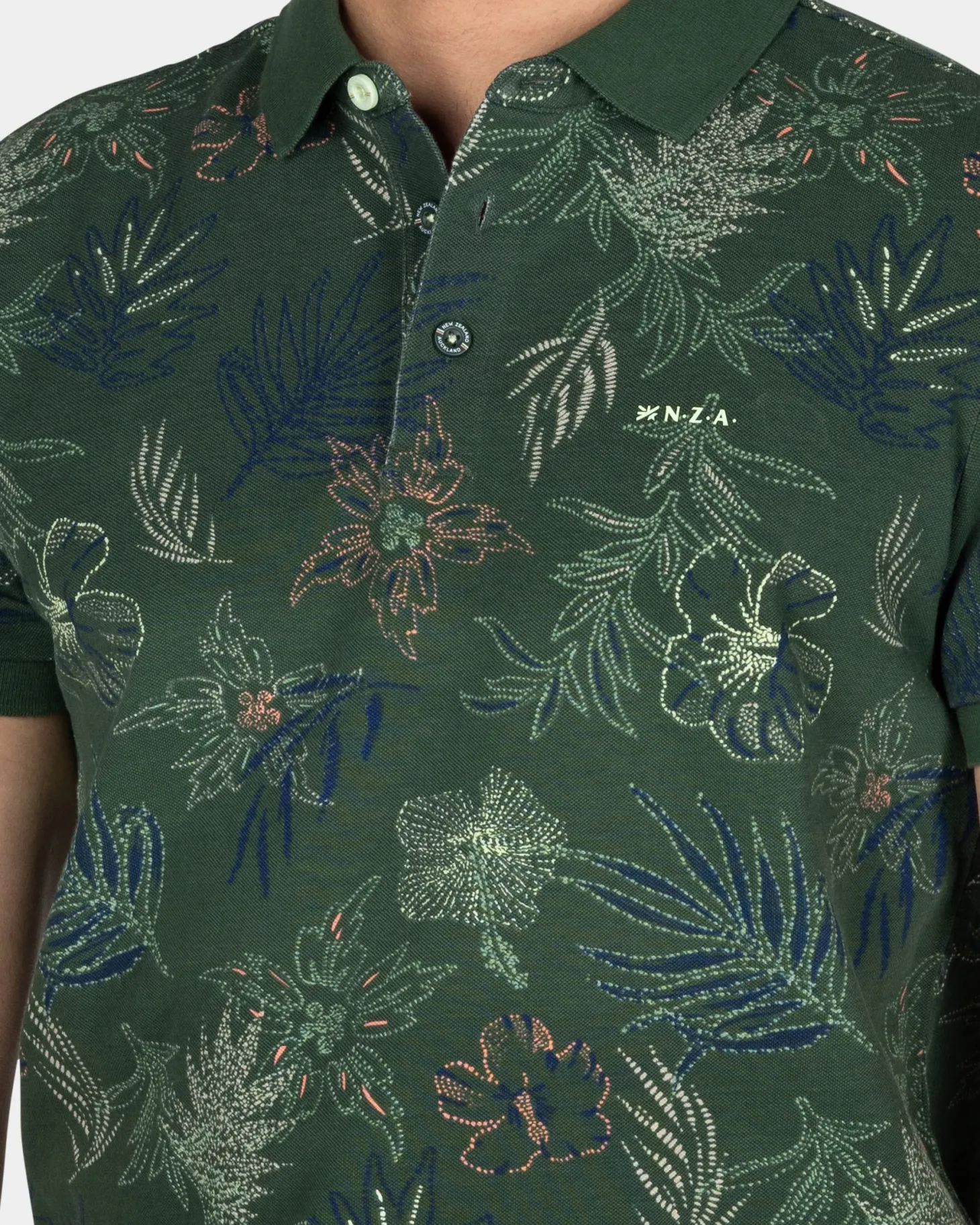 Baumwollgrüne Polo mit Blattprint