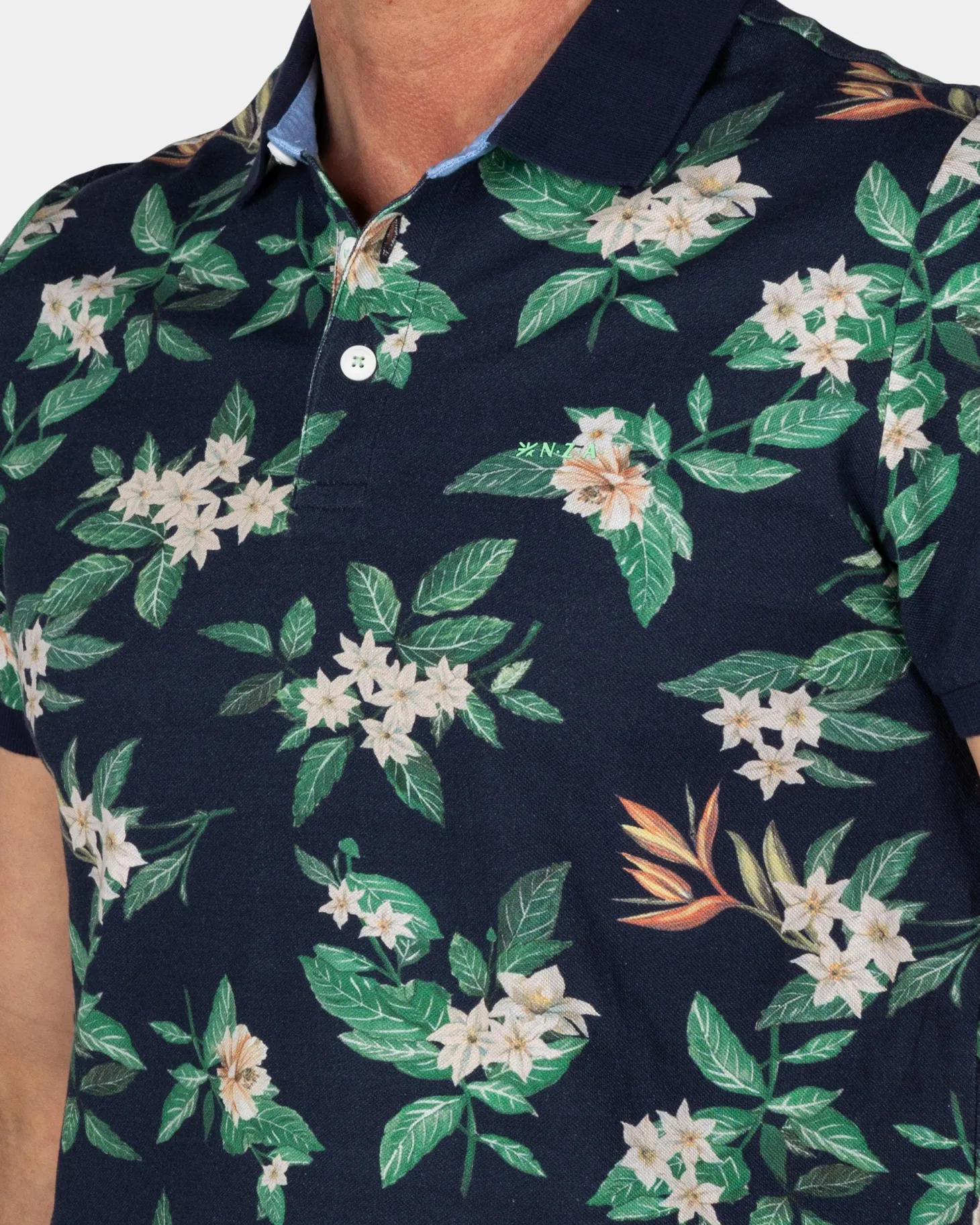 Dunkelblaues Poloshirt mit Blumenmuster