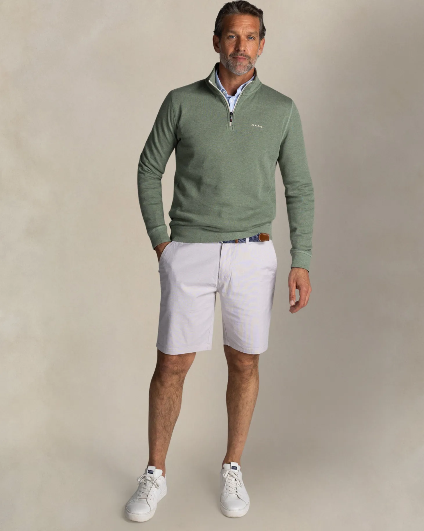 Grüner pullover mit halbem reißverschluss aus baumwolle