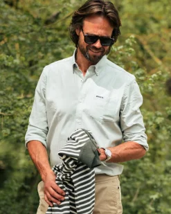 Hellgrünes einfarbiges Baumwollhemd