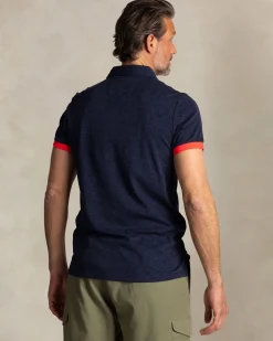 Marineblaues Poloshirt mit Blattmuster