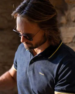 Marineblaues Poloshirt mit Blattdruck