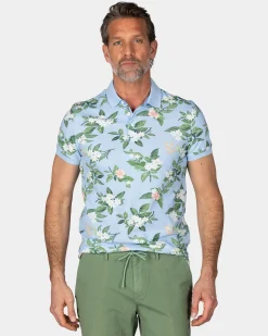 Pastellblaue Polo mit großem Blumenprint