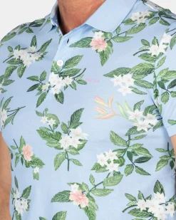 Pastellblaue Polo mit großem Blumenprint