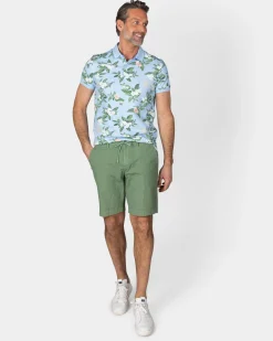 Pastellblaue Polo mit großem Blumenprint