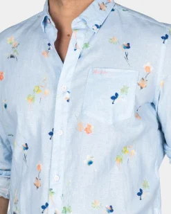 Pastellblaues Hemd mit bunten Blumen