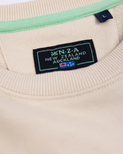 Weißer Pullover mit hellblauen Streifen