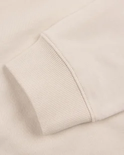 Weißer Pullover mit hellblauen Streifen